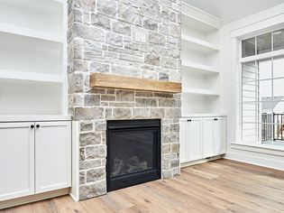 How to Whitewash a Stone Fireplace for an Easy DIY Makeover
